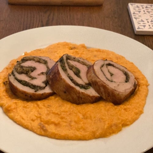 Porchetta over Whipped Sweet Potatoes.
